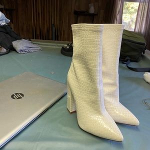 White heeled boots
